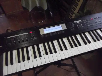 Синтезатор Korg TR 61 Рабочая станция.-0